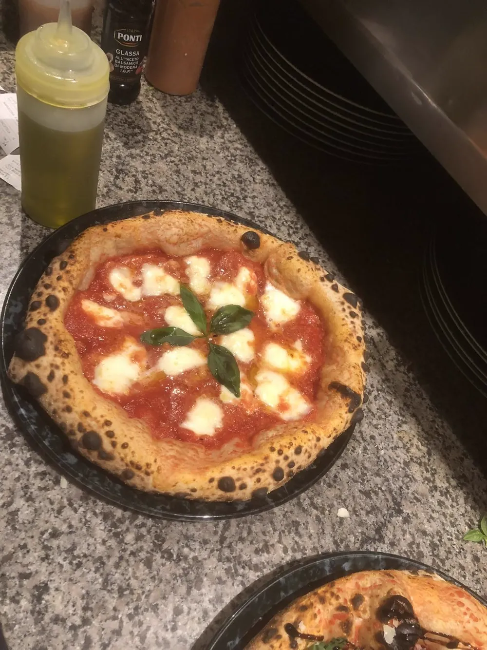 Classic Margherita pizza with fior di latte and fresh basil